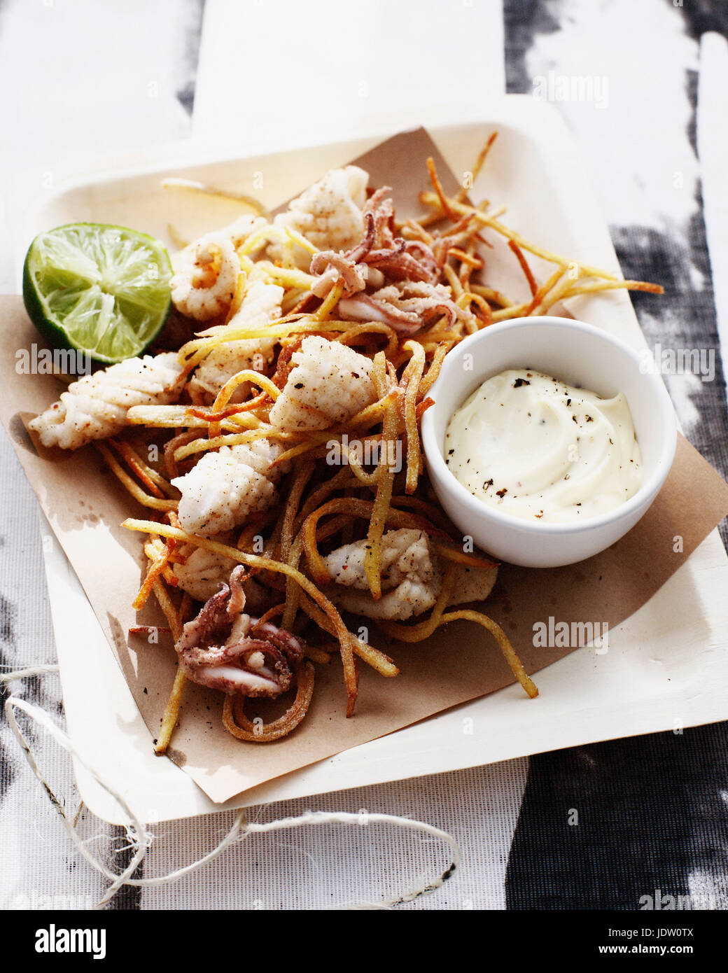Salt and pepper squid with herb and garlic salt chips recipe