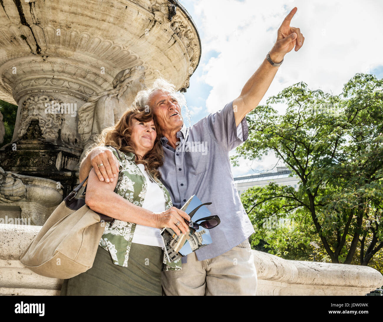 Older couple sightseeing together Stock Photo