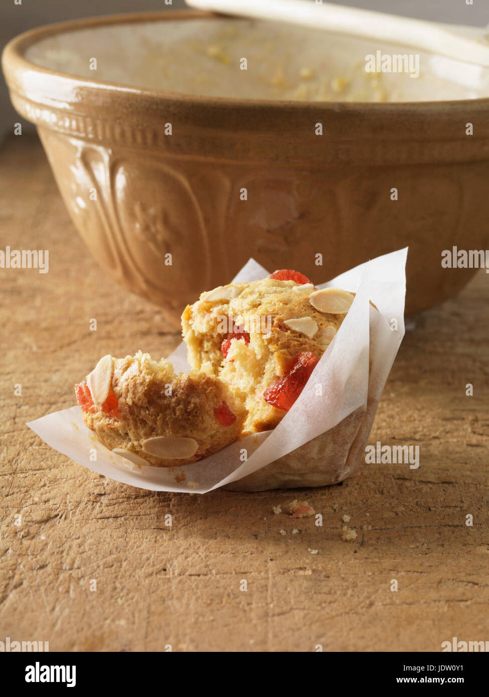 Broken cherry almond muffin Stock Photo