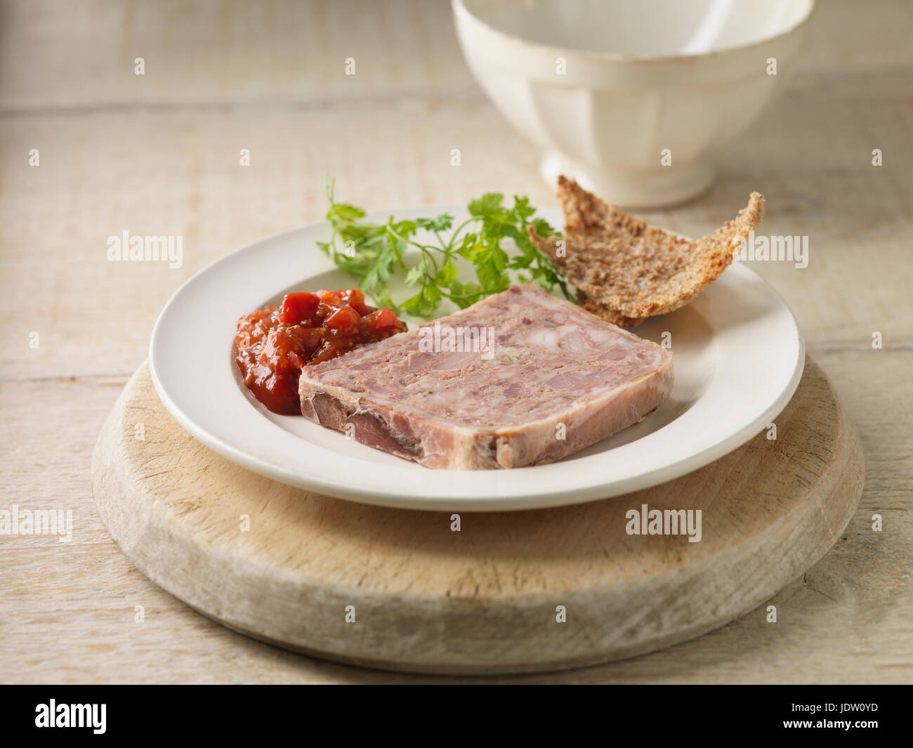 Plate of pork terrine with chutney Stock Photo Alamy