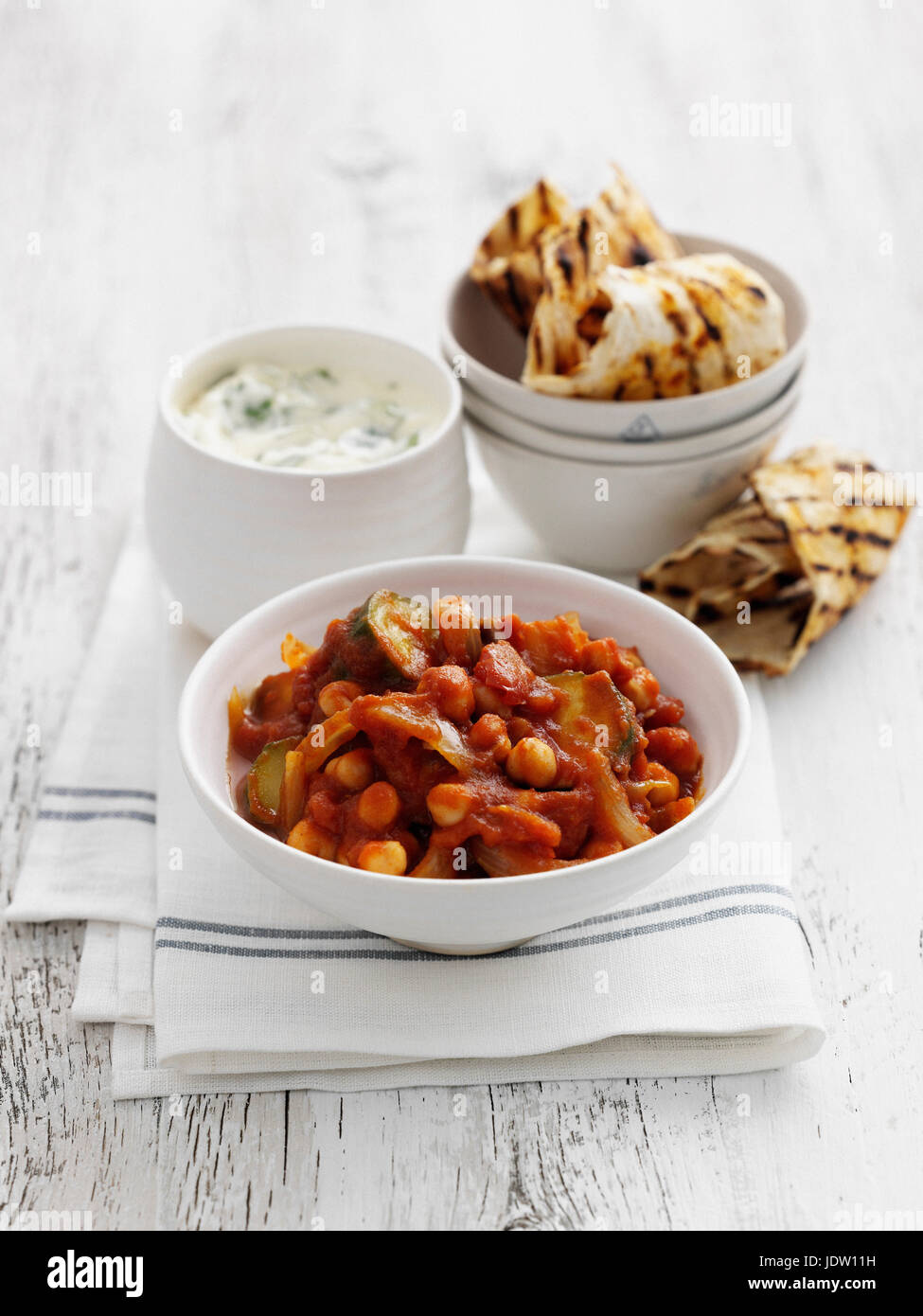 Plate of chickpea stew and bread Stock Photo