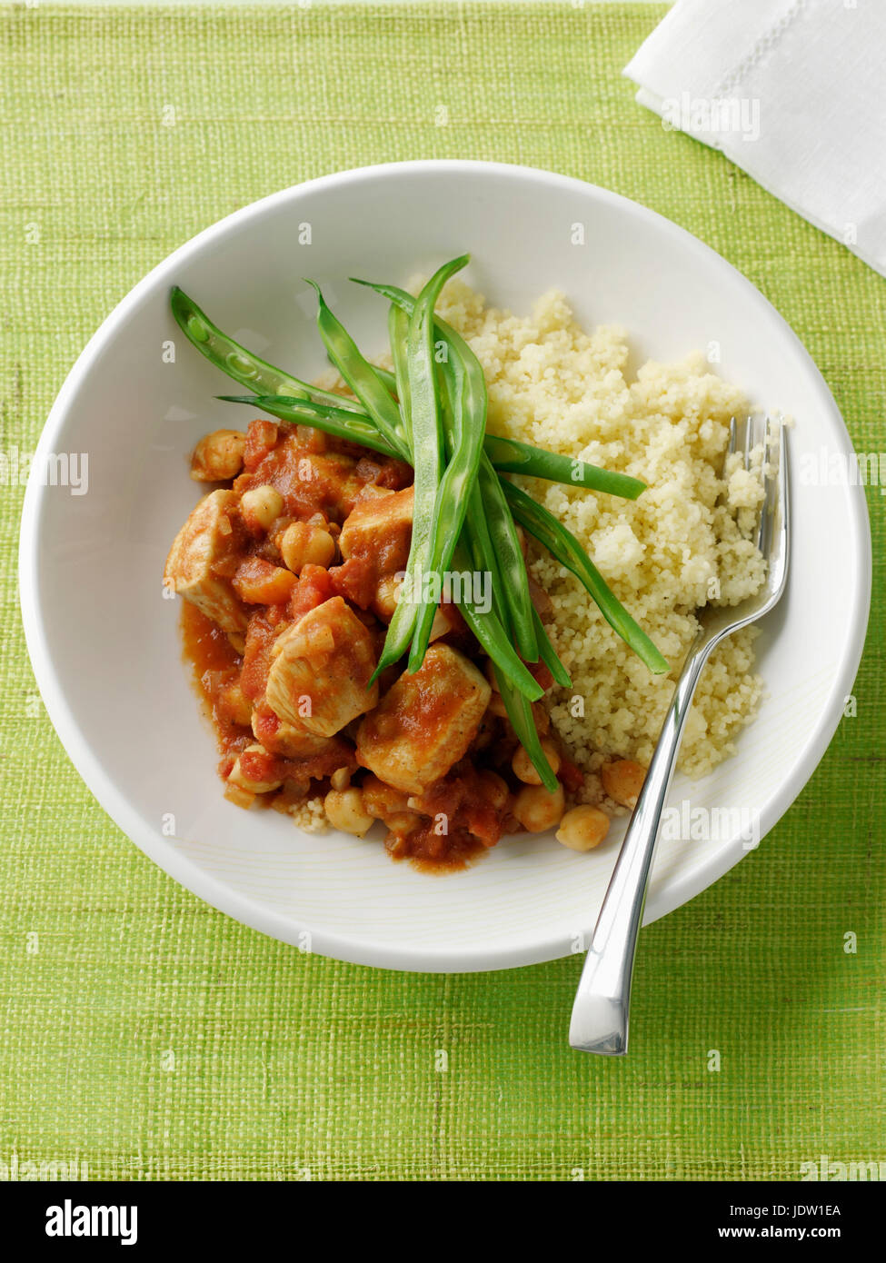 Bowl of cous cous with green beans Stock Photo