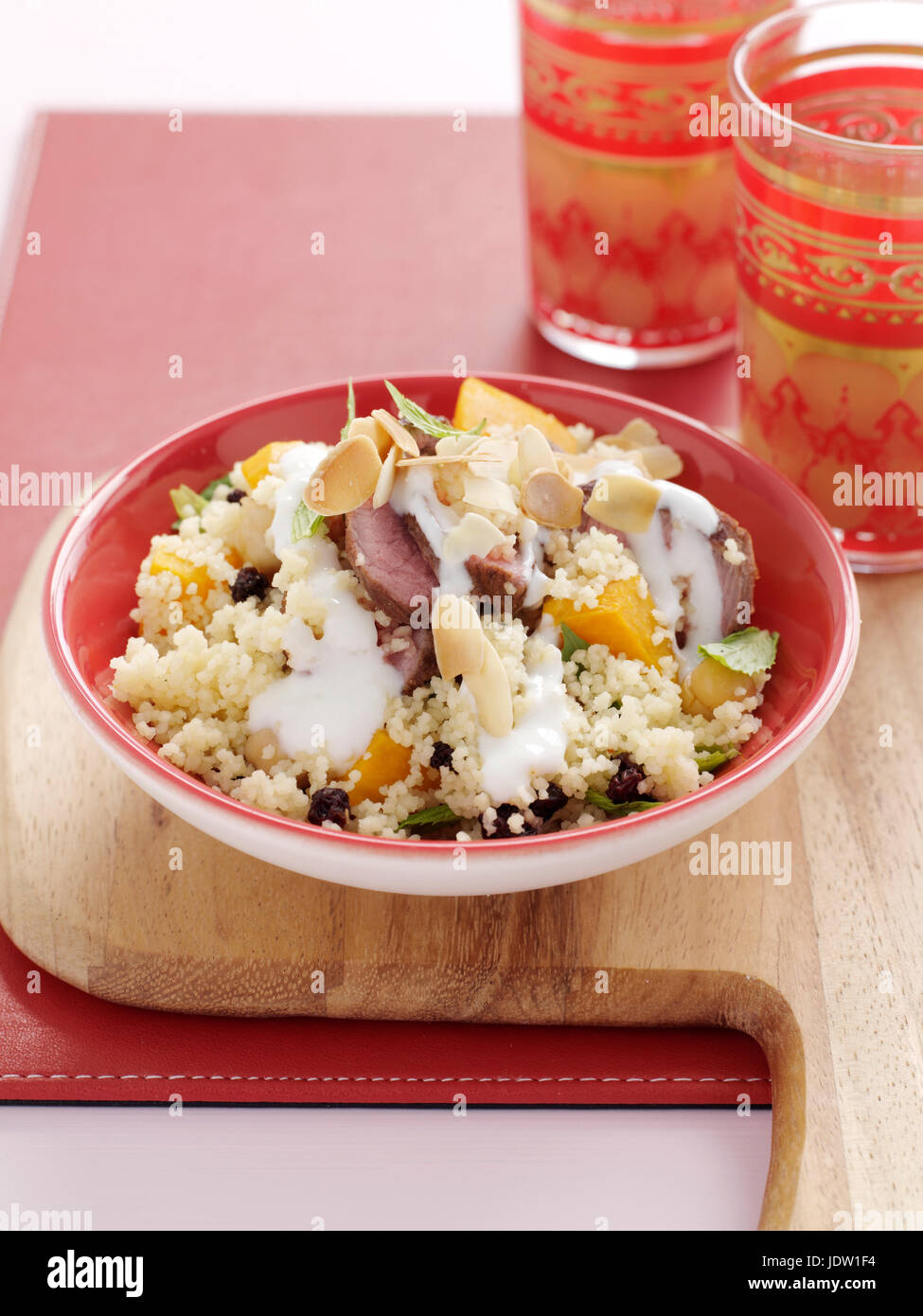 Plate of lamb with couscous Stock Photo Alamy