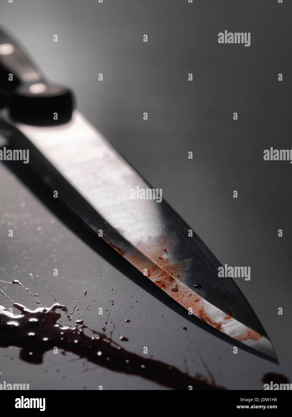 Close up of bloody knife Stock Photo
