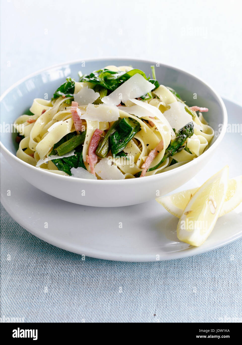 Bowl of pasta with vegetables and cheese Stock Photo