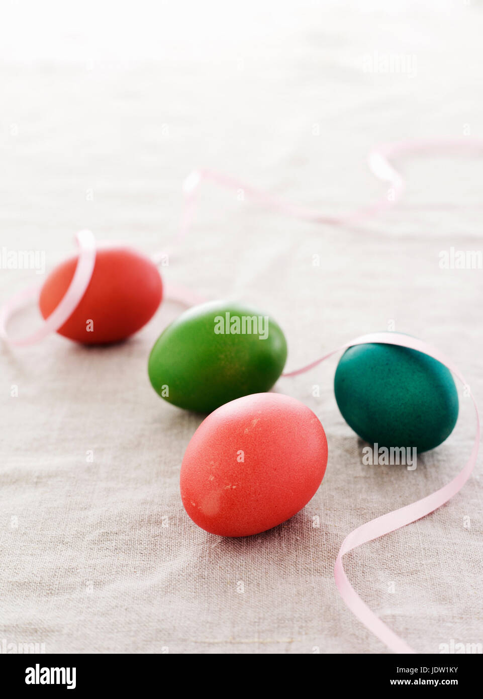 Colorful Easter eggs with ribbon Stock Photo