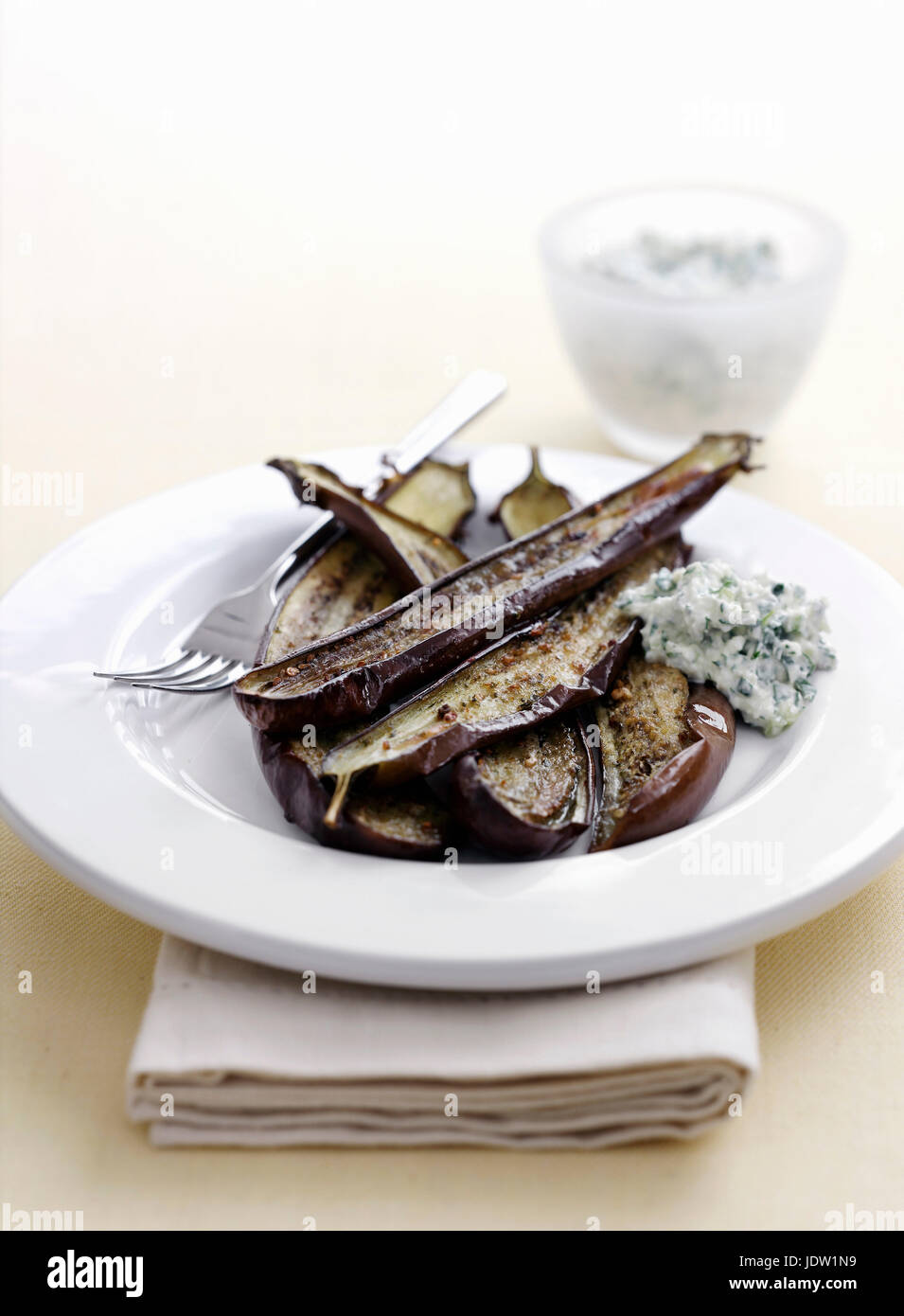 Bowl of roasted eggplant Stock Photo Alamy