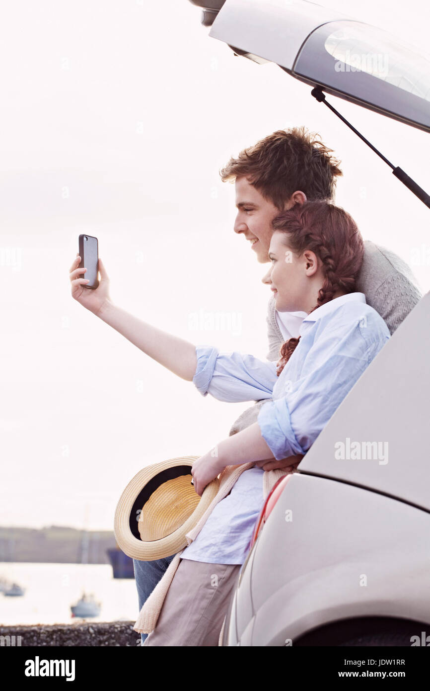 Couple taking picture of themselves Stock Photo