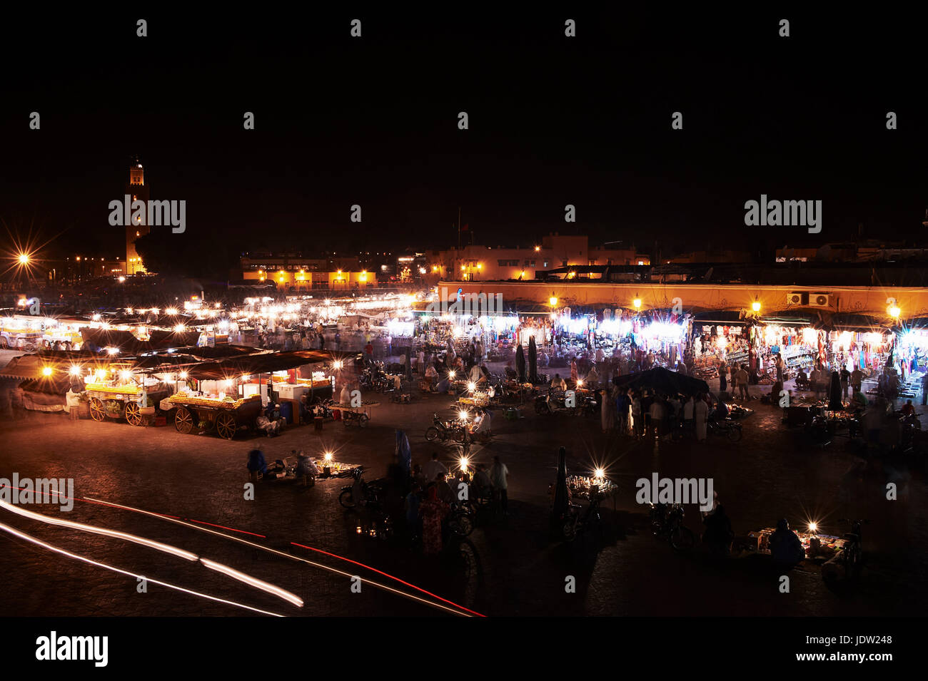 Time lapse view of urban market at night Stock Photo