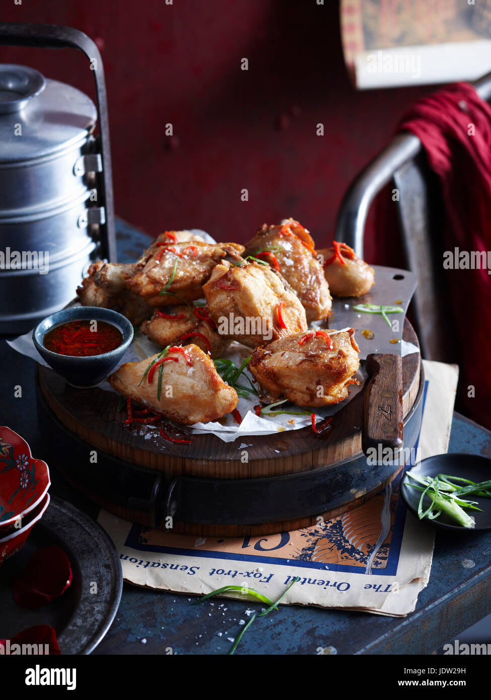 Roasted chicken with onion and sauce Stock Photo Alamy
