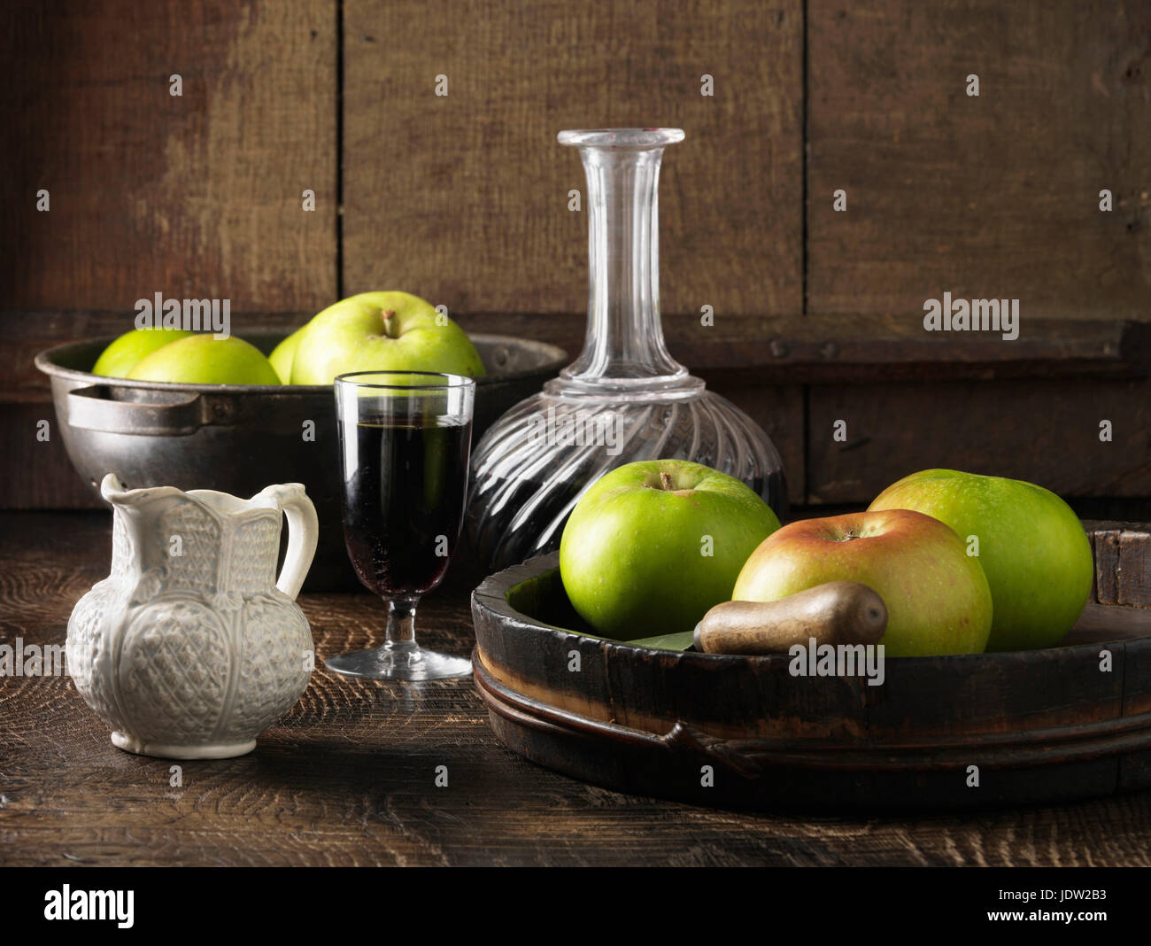 Apples with decanter of port Stock Photo