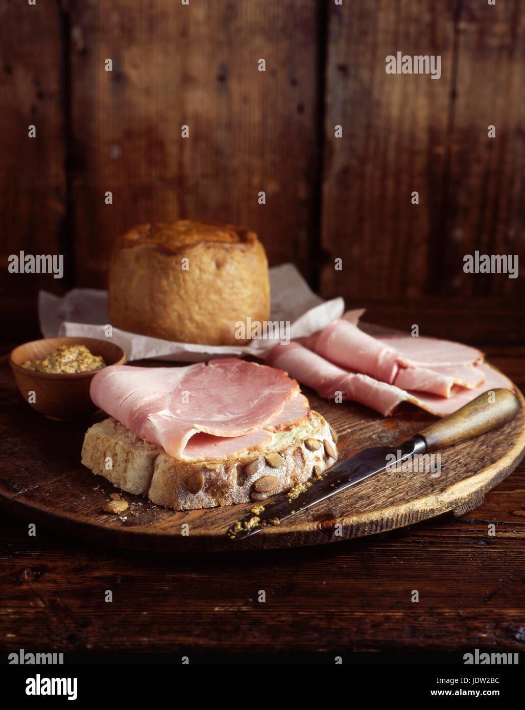 Plate of ham and bread Stock Photo