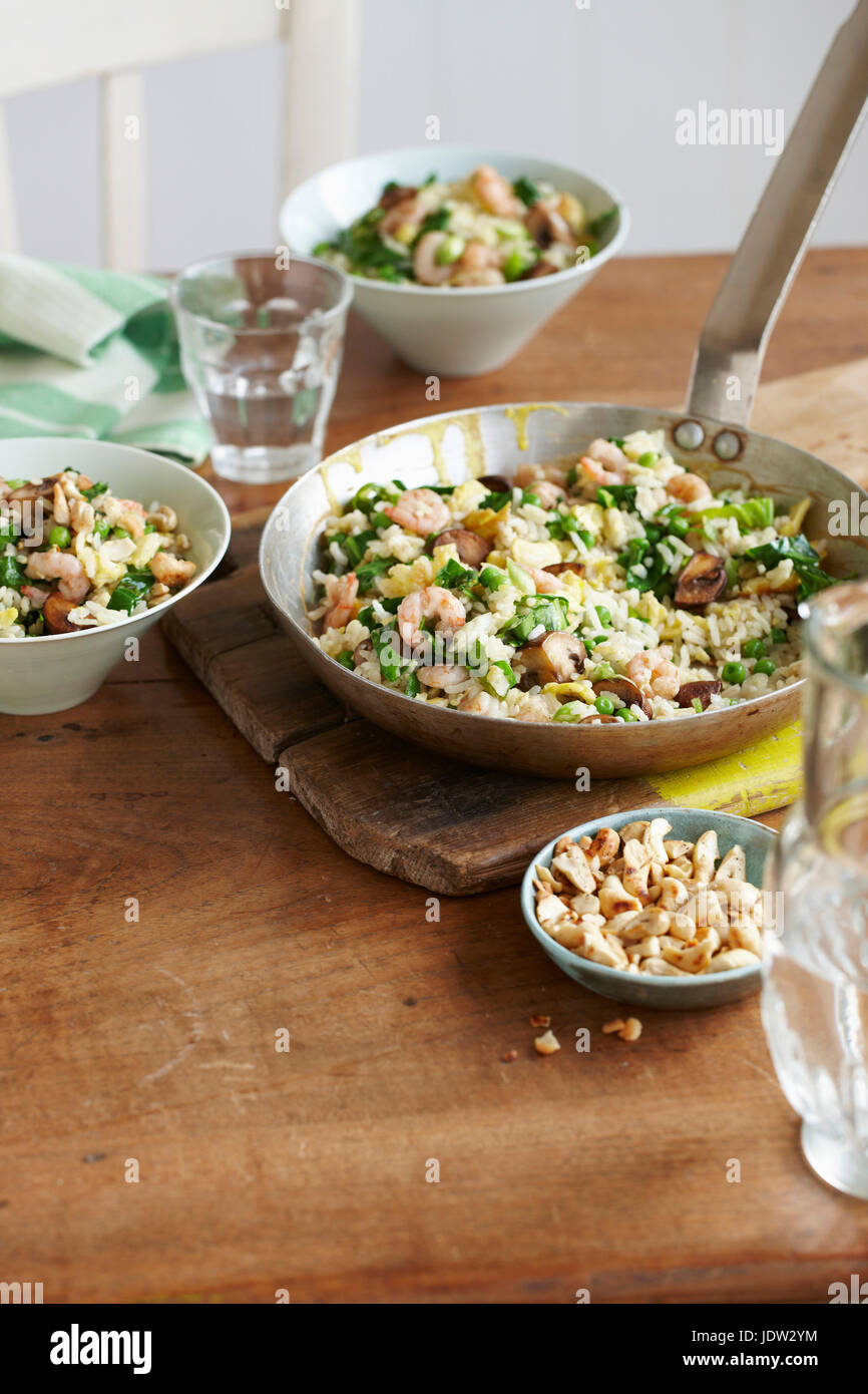 Pan of prawn egg fried rice Stock Photo