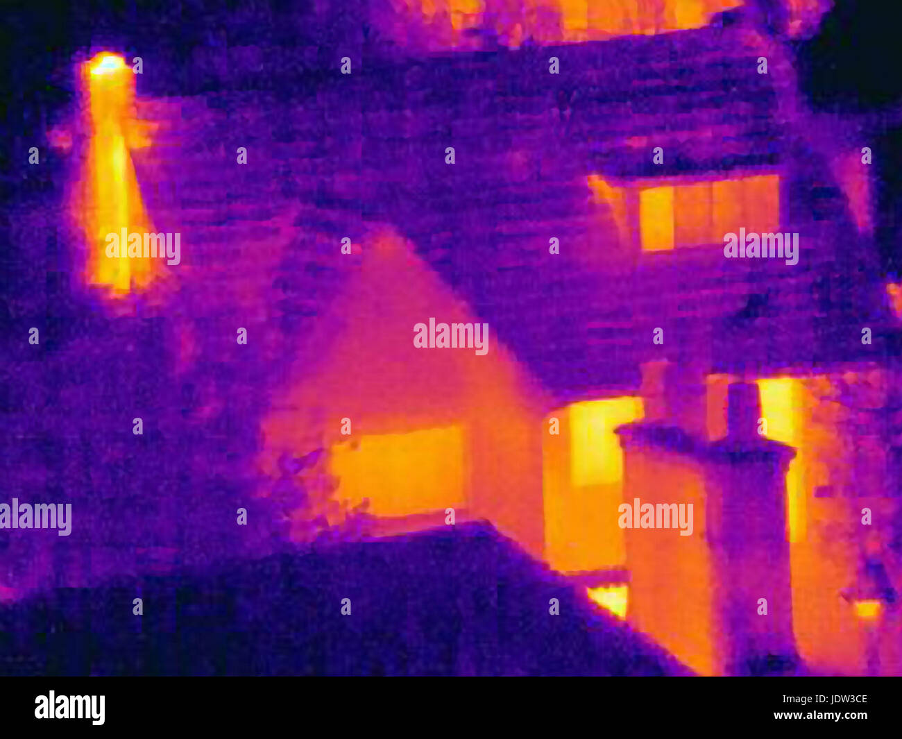 Thermal image of house and rooftops Stock Photo