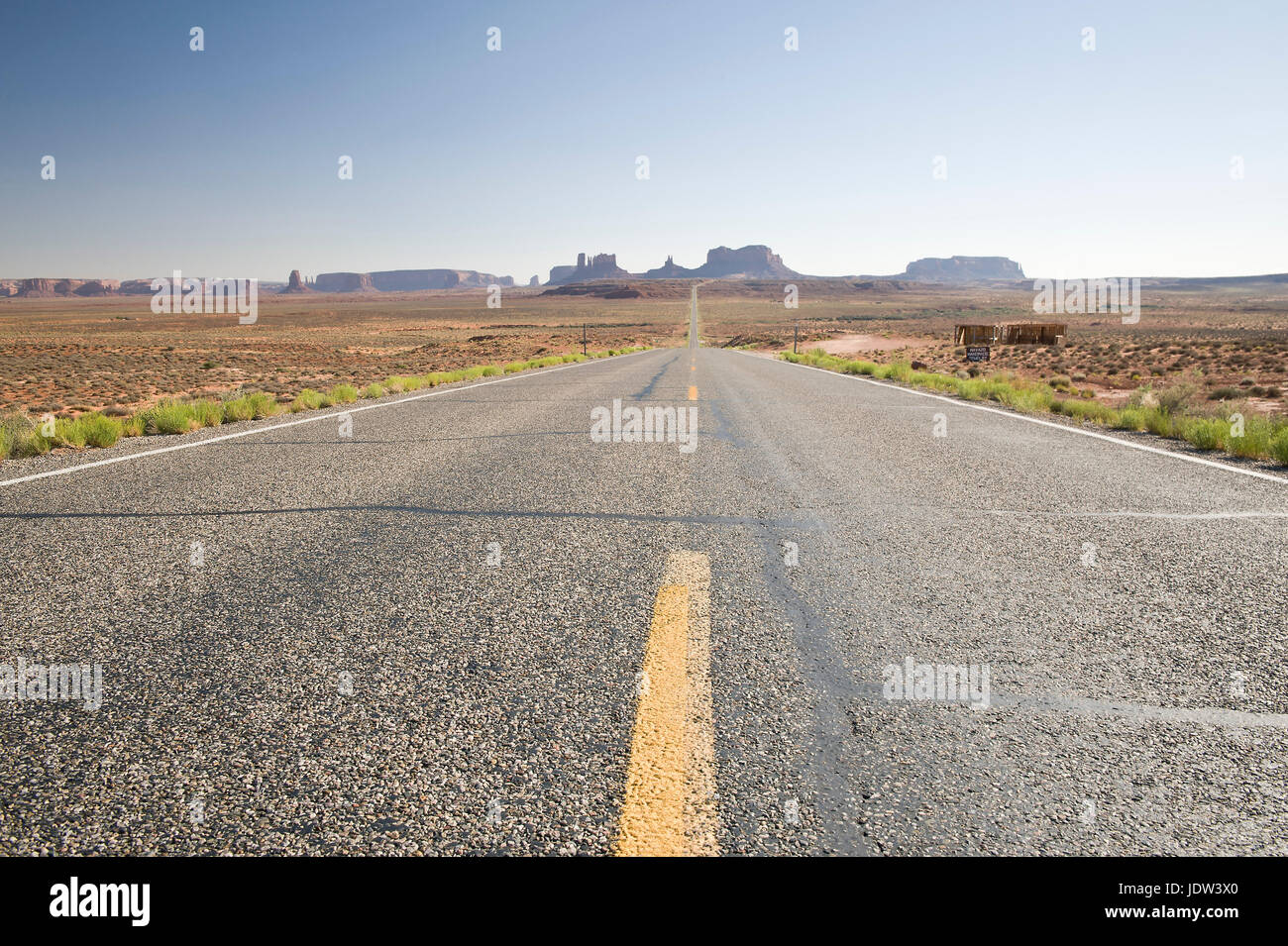 Road through Monument Valley Navajo Tribal Park, Utah, USA Stock Photo