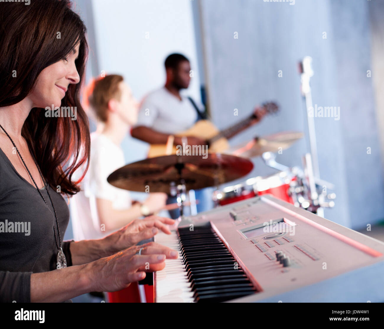 Band practising in recording studio Stock Photo Alamy