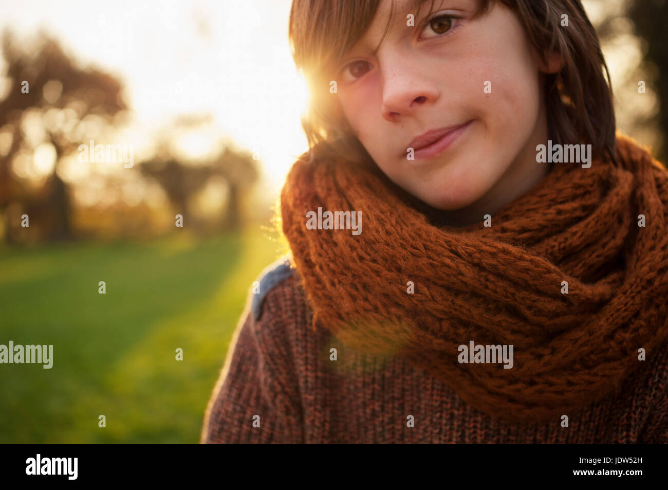 Boy in scarf in countryside, portrait Stock Photo