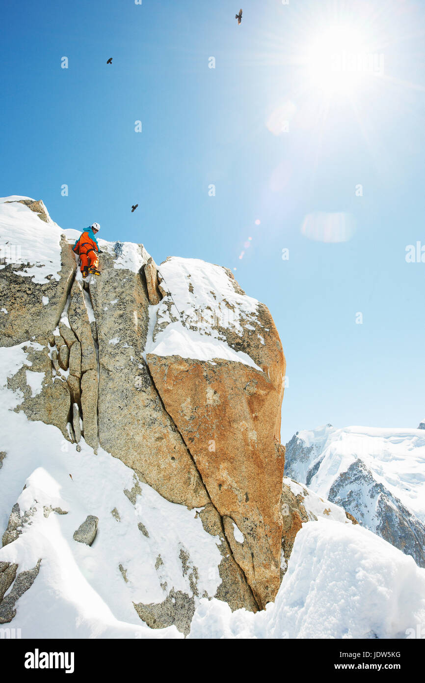 Man rock climbing in mountains, Chamonix, France Stock Photo