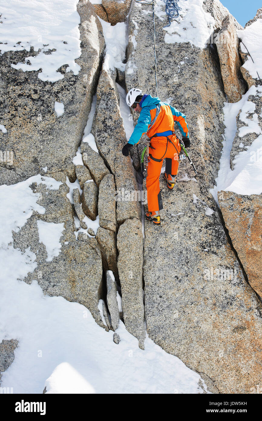 Man rock climbing Stock Photo