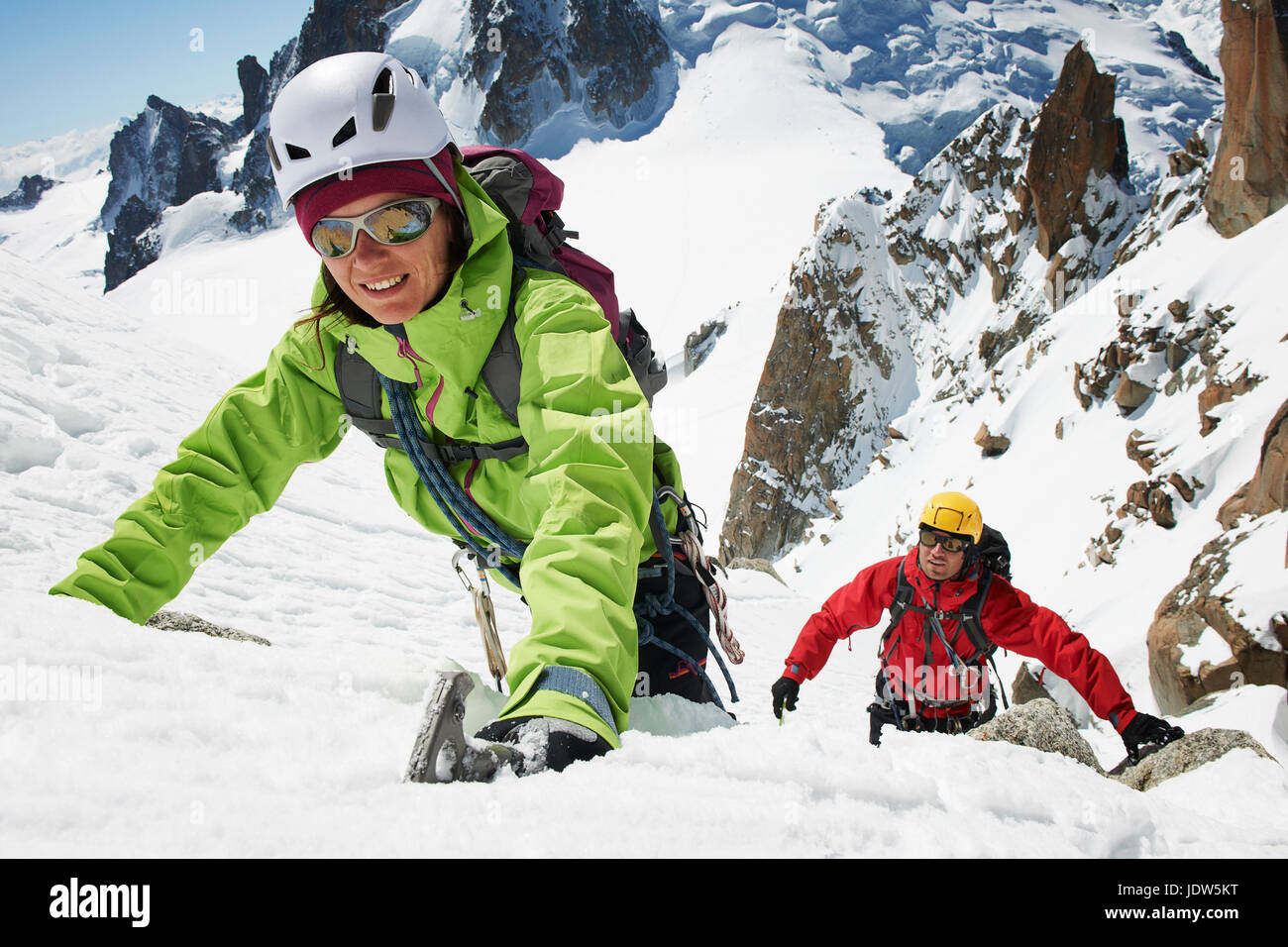 Two people mountain climbing, Chamonix, France Stock Photo