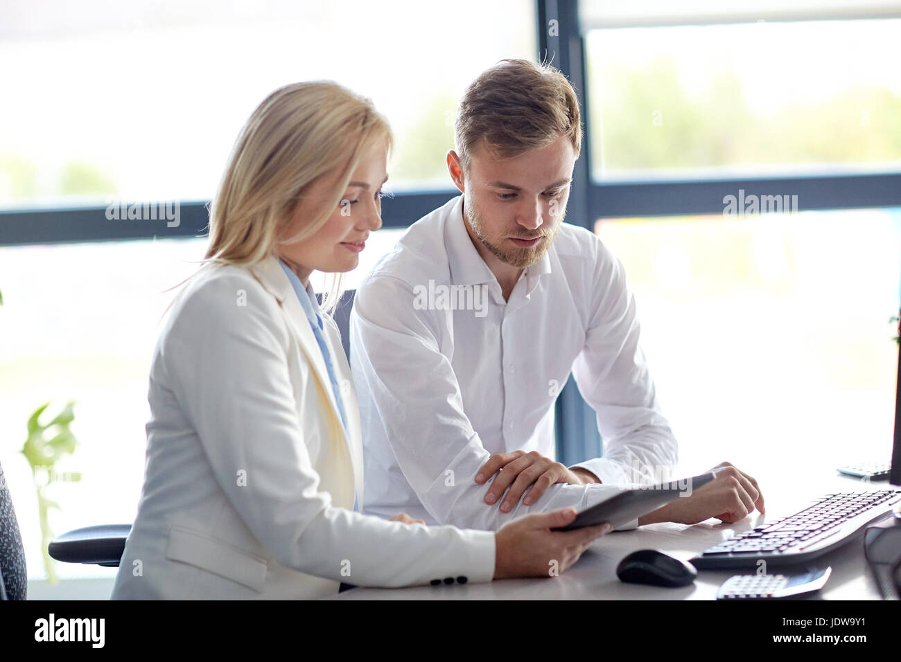 Team computer serious hi-res stock photography and images - Alamy