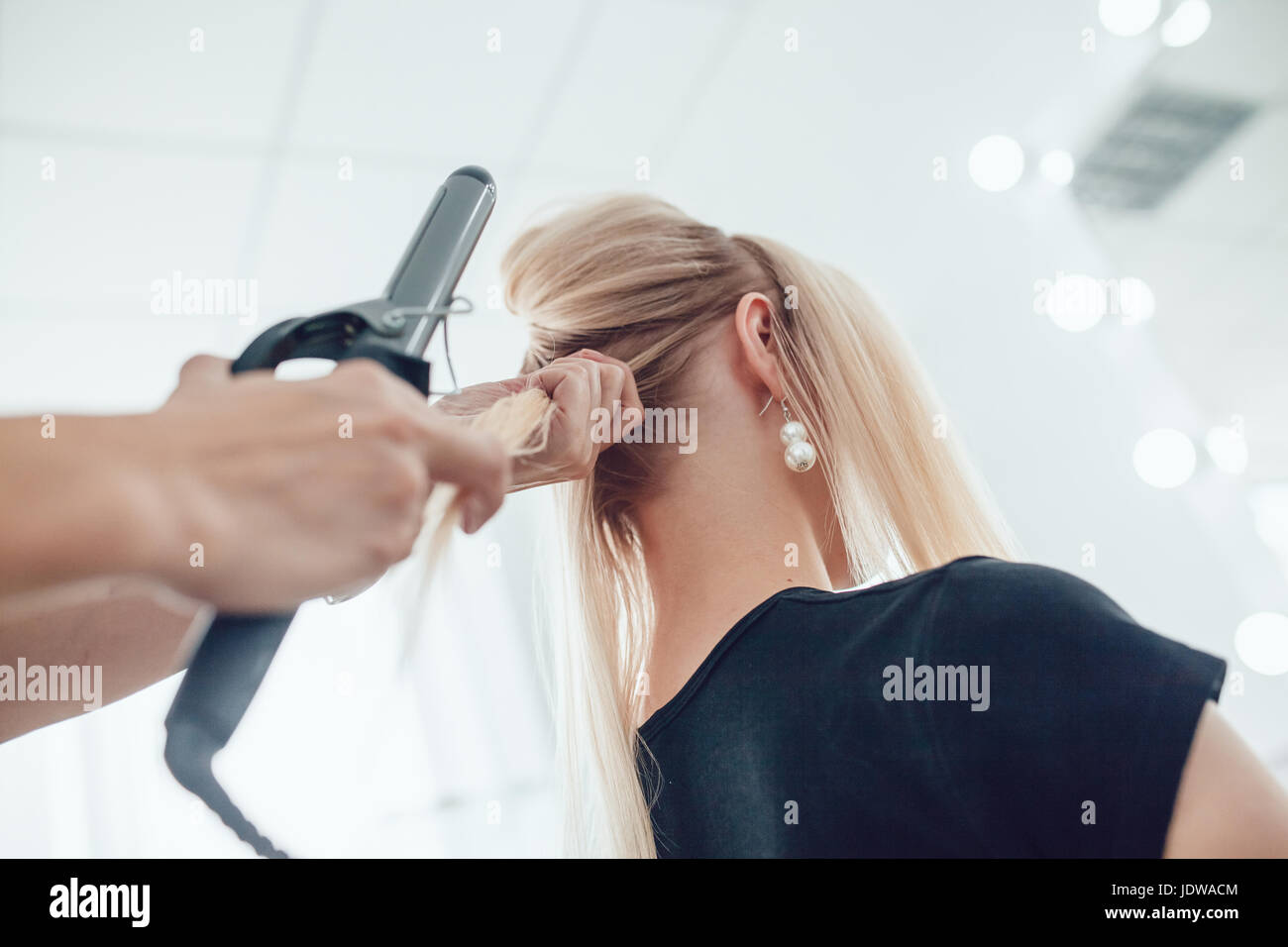 Female using hairbrush girl hi-res stock photography and images - Alamy