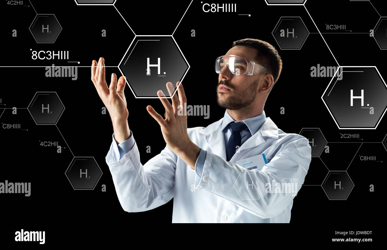 scientist in lab goggles chemical formula Stock Photo Alamy