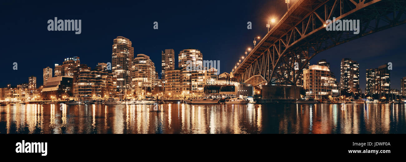 Vancouver False Creek at night with bridge and boat panorama Stock ...