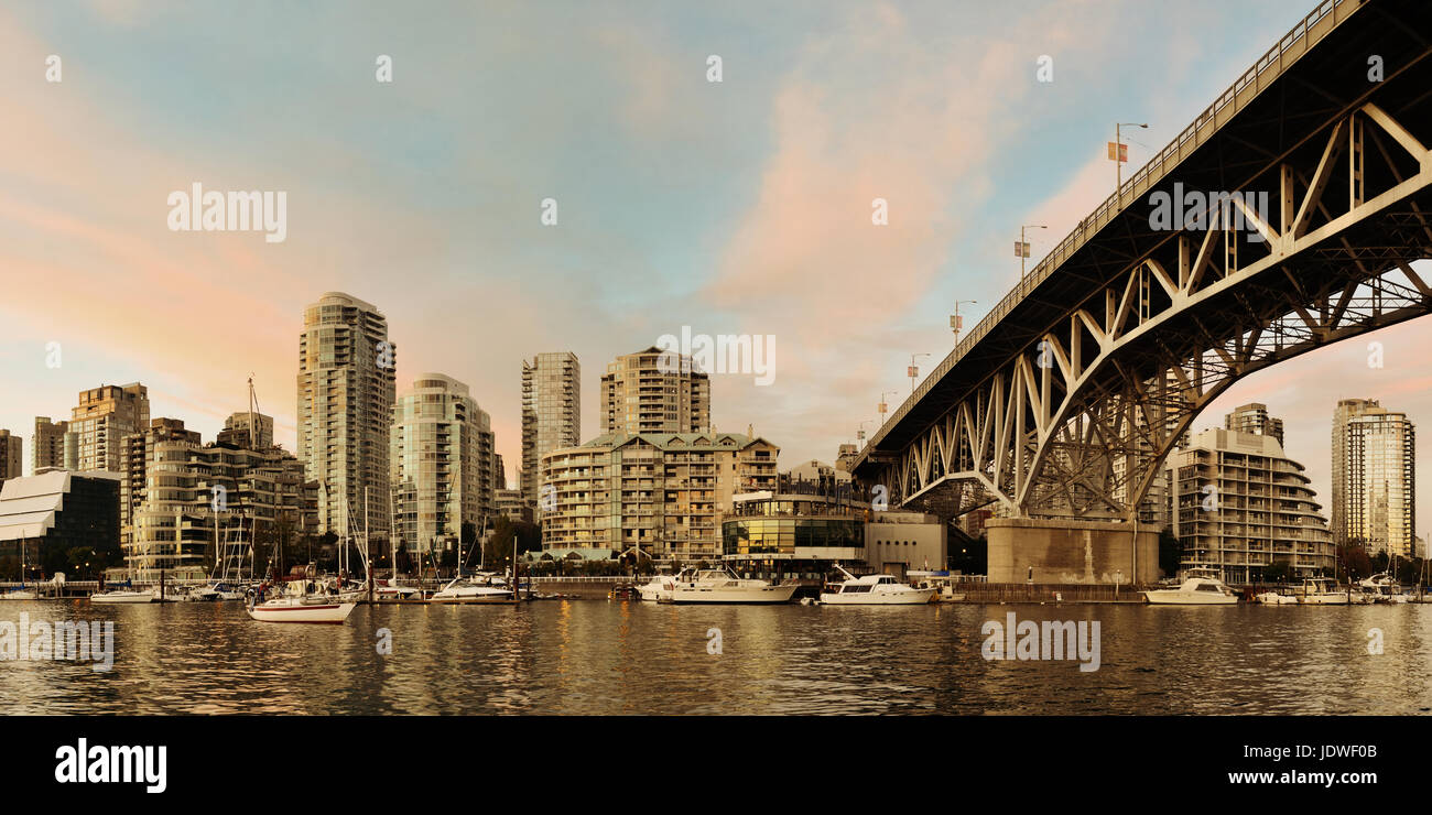 Vancouver False Creek panorama at sunset with bridge and boat Stock ...