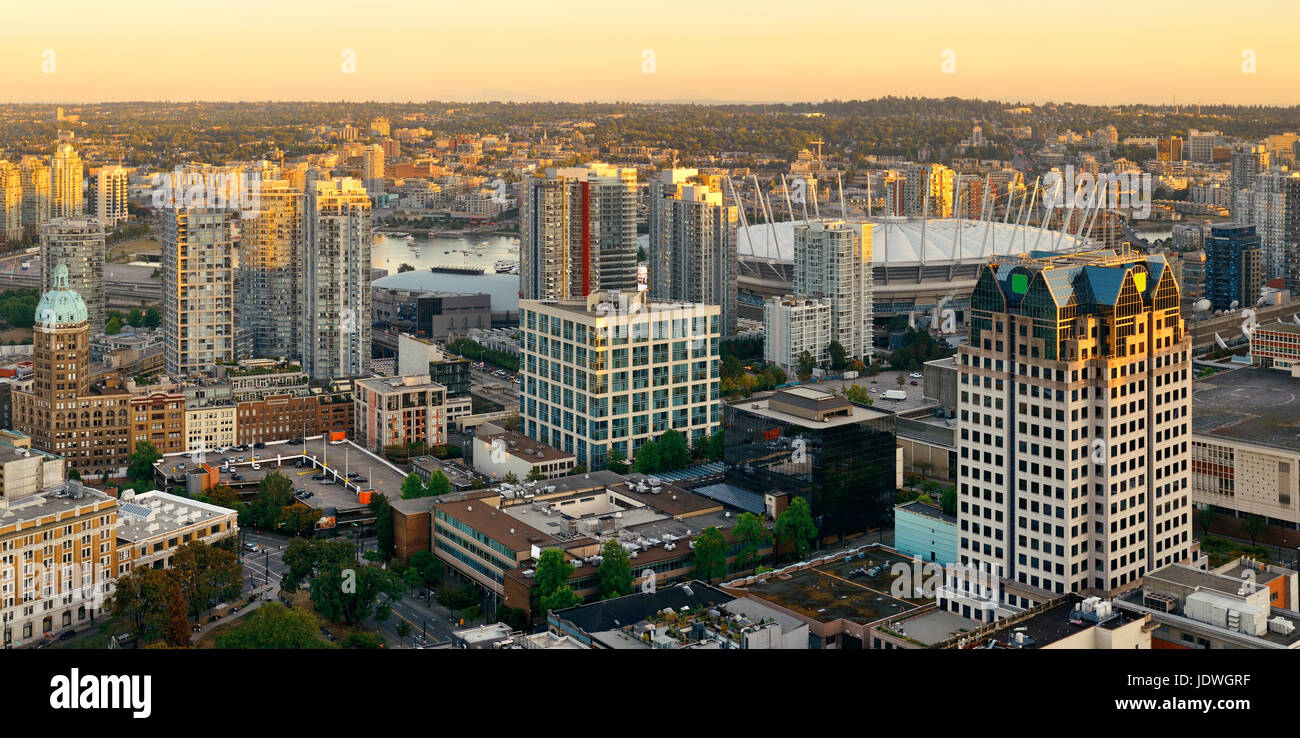 Vancouver rooftop view with urban architectures at sunset. Stock Photo