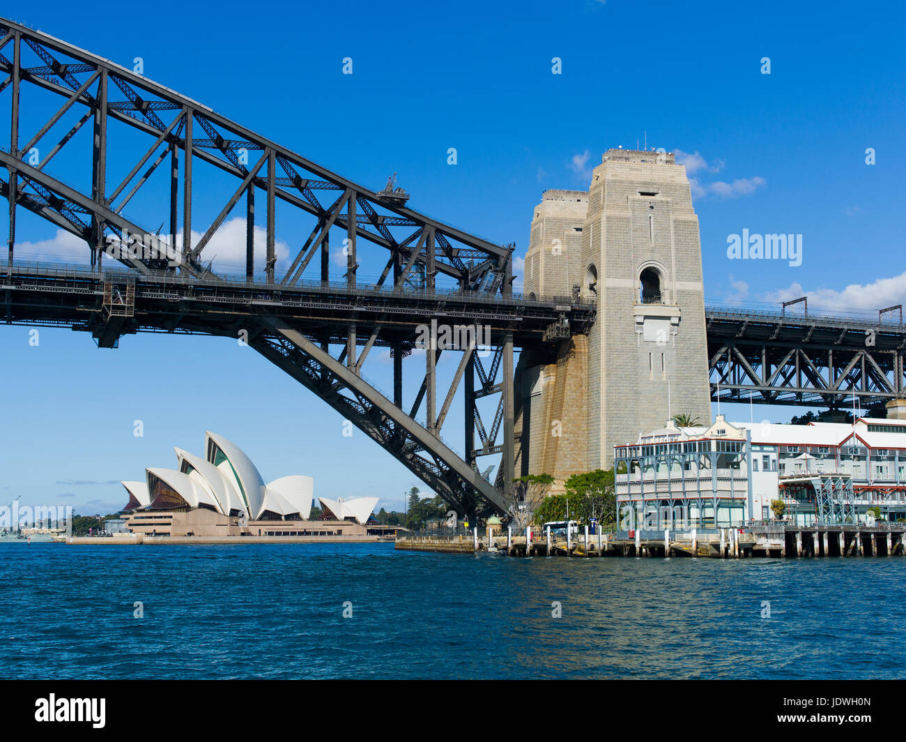 Harbour Bridge and Opera House, Sydney, viewed from a ferry, NSW, Australia, Winter Sunshine Stock Photo