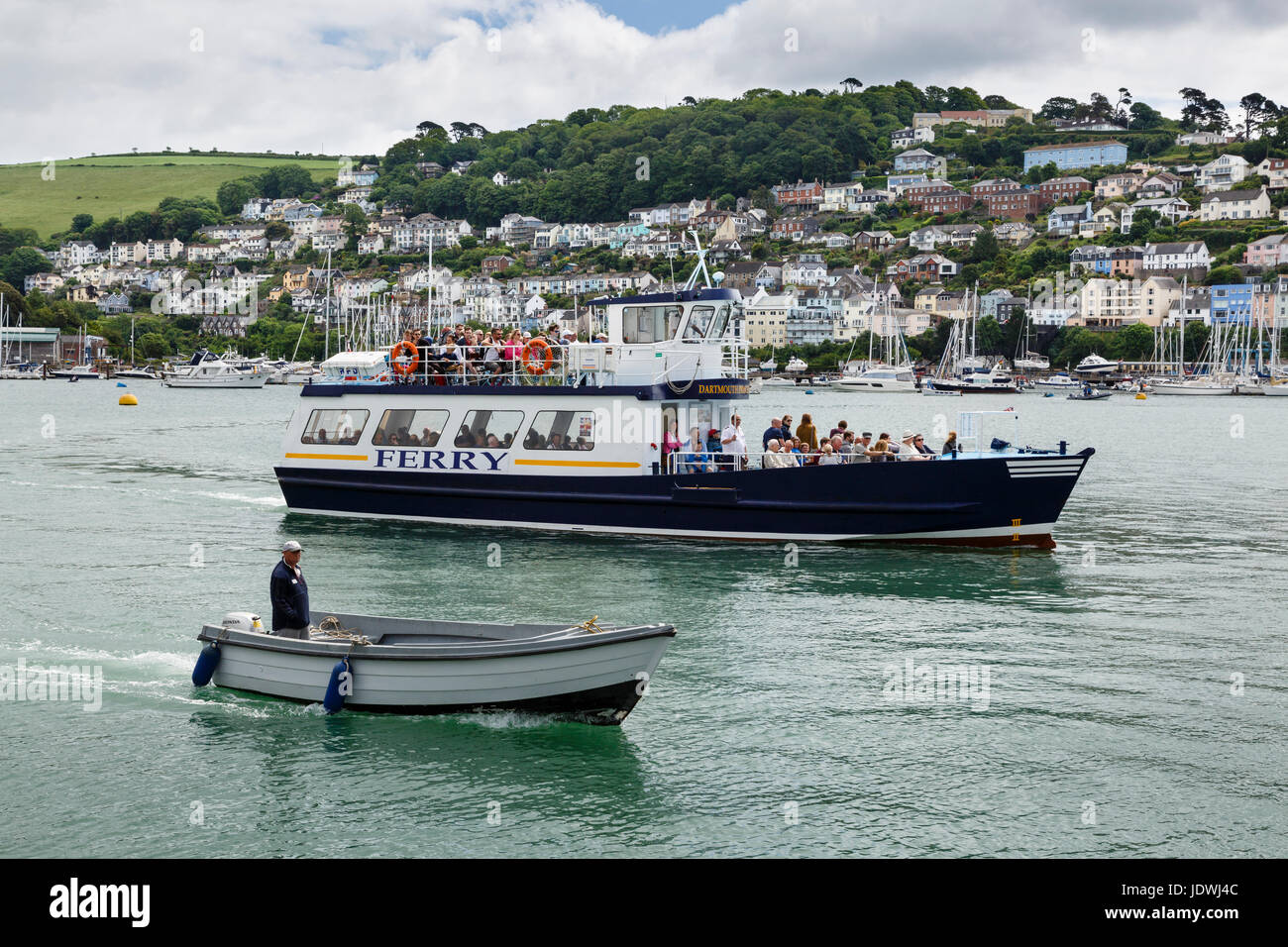 The Dartmouth ferry with Kingswear in the background, Devon Stock Photo