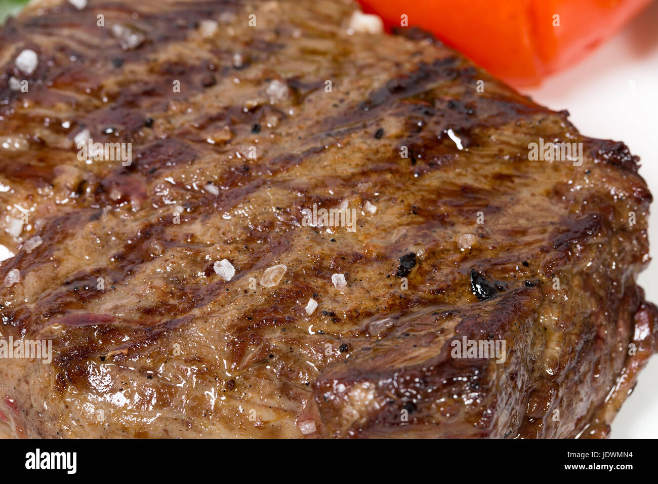Grilled beef steak closeup. Macro. Photo can be used as a whole