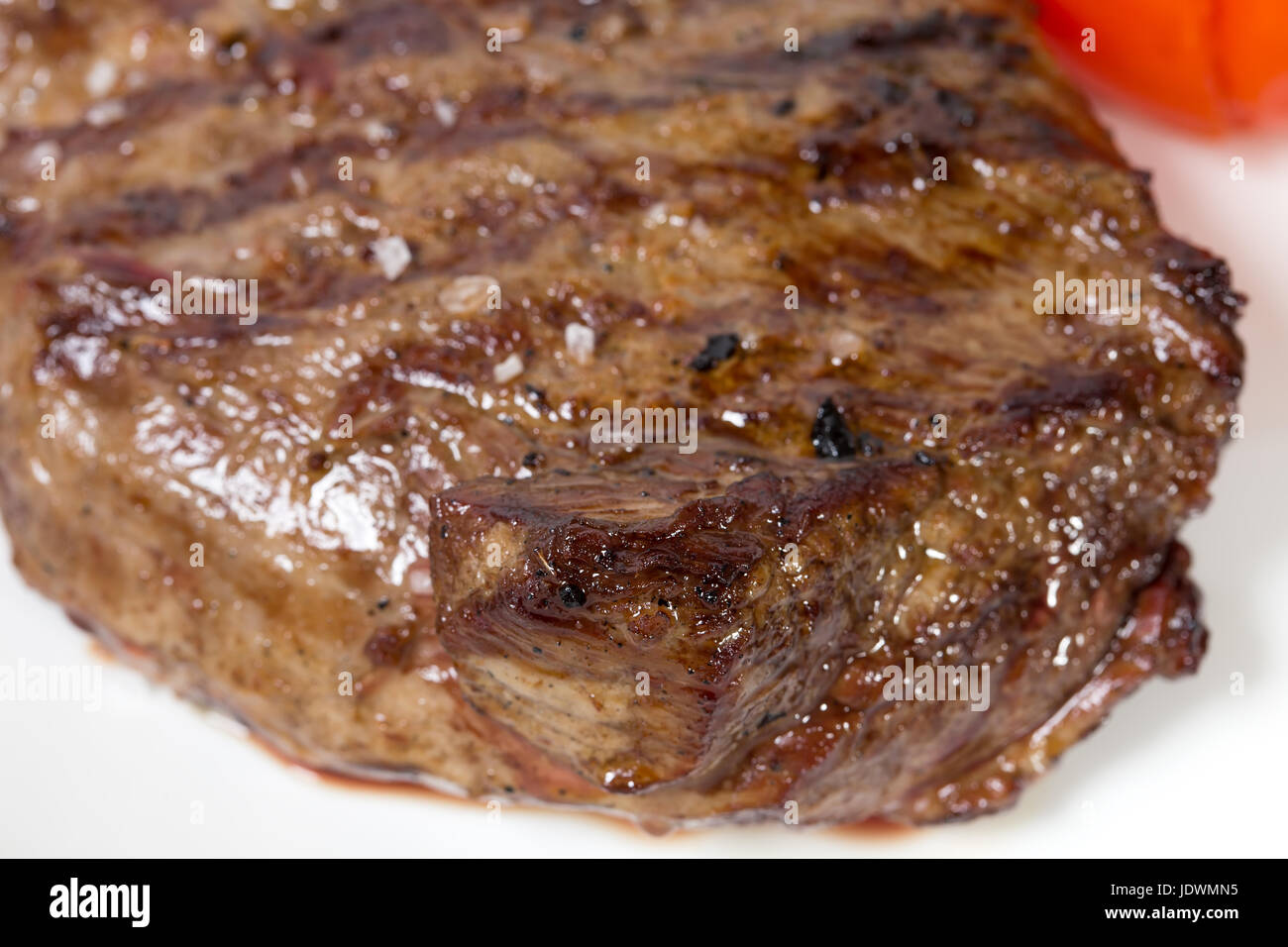 Grilled beef steak closeup. Macro. Photo can be used as a whole