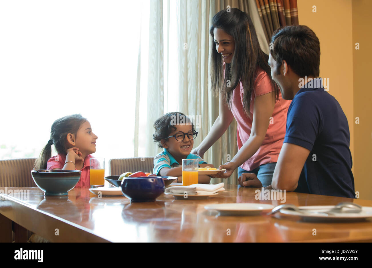 Family dining table hi-res stock photography and images - Alamy