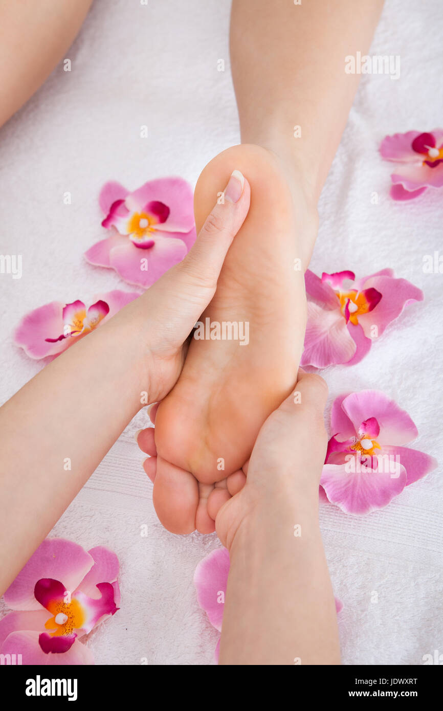 Closeup Of Woman's Feet Receiving Foot Massage In Spa Stock Photo Alamy