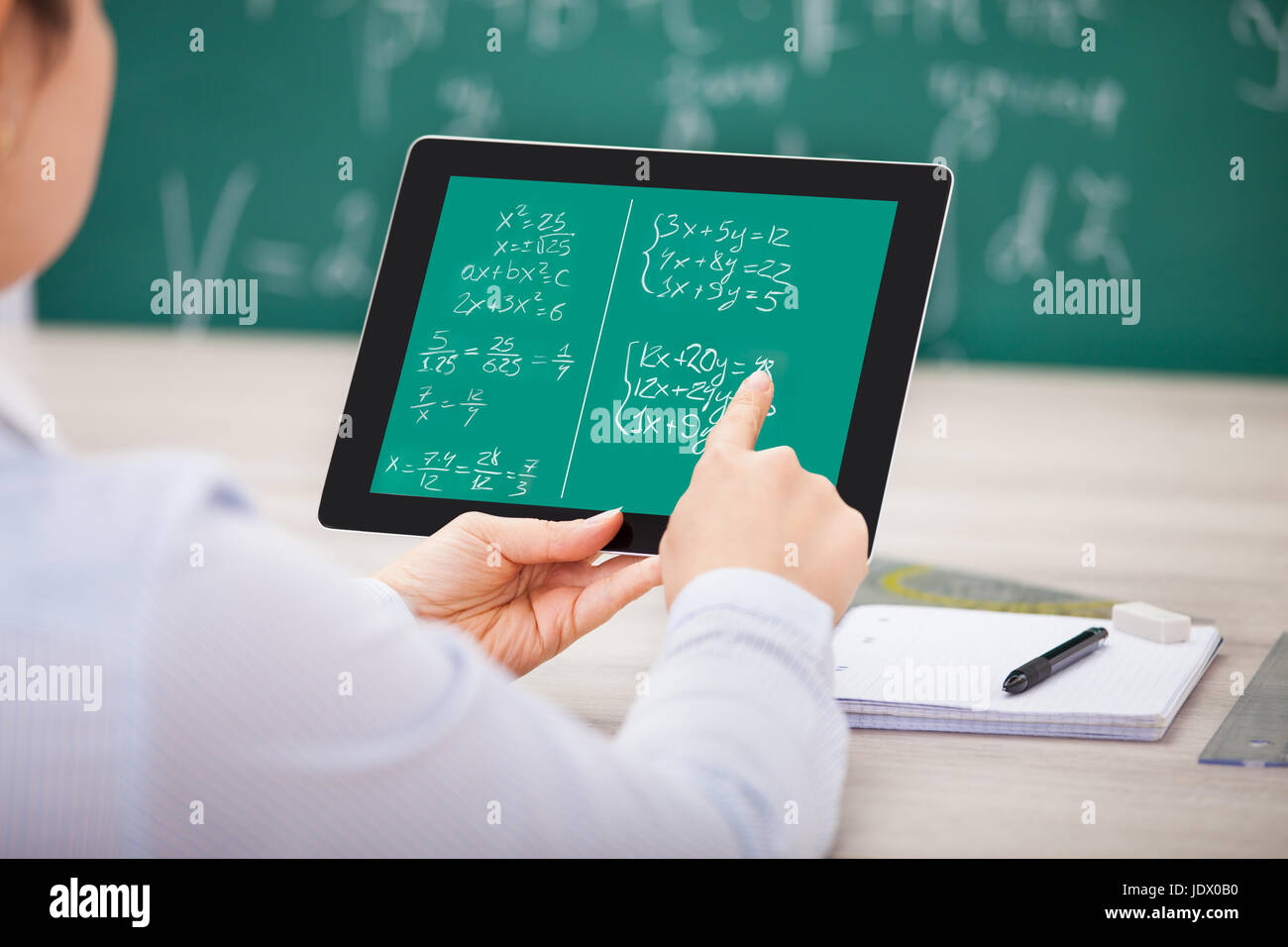 Close-up Of Student Learning Mathematical Equations On Digital Tablet ...
