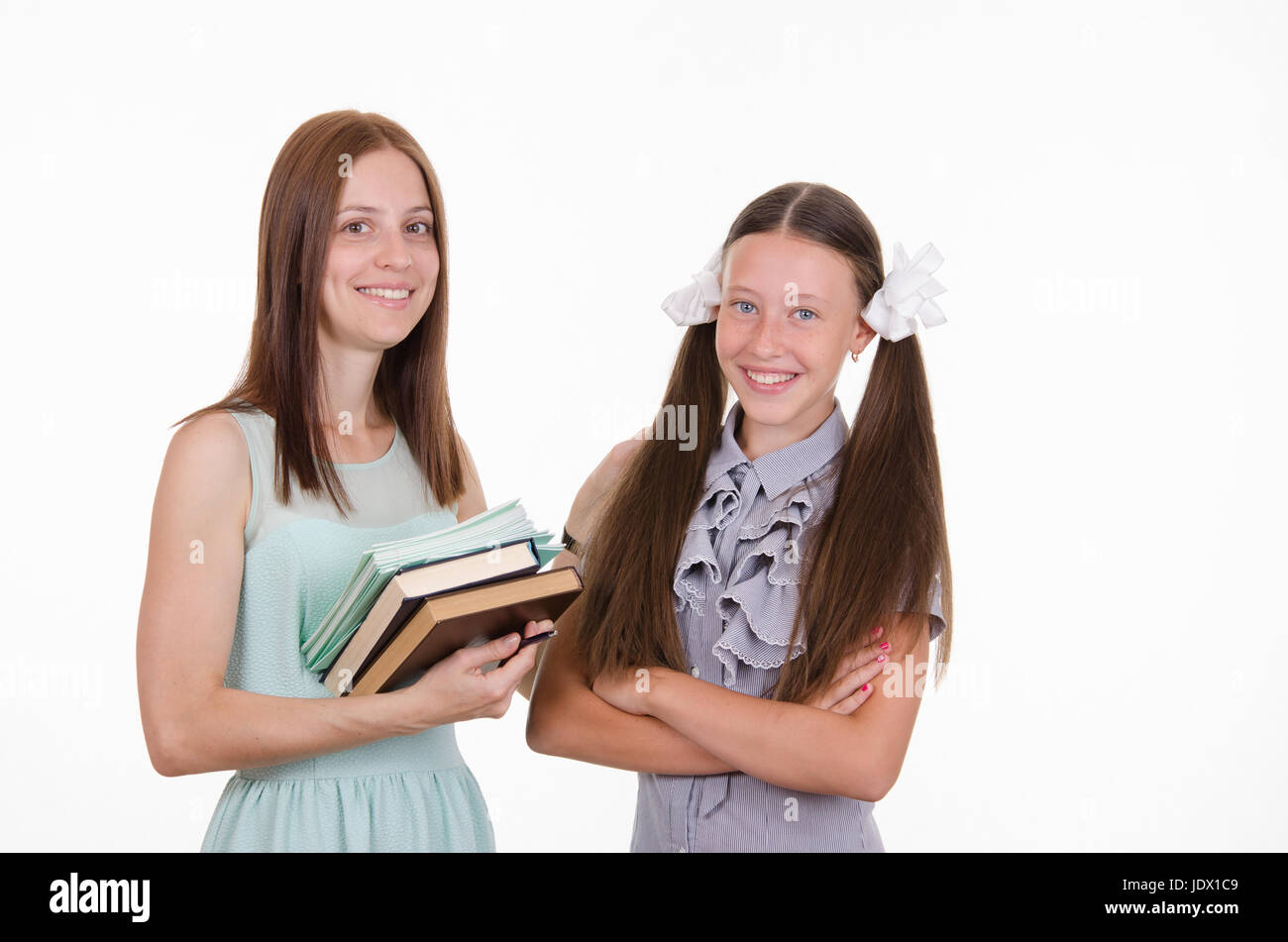 Portrait of a school teacher and a diligent student Stock Photo