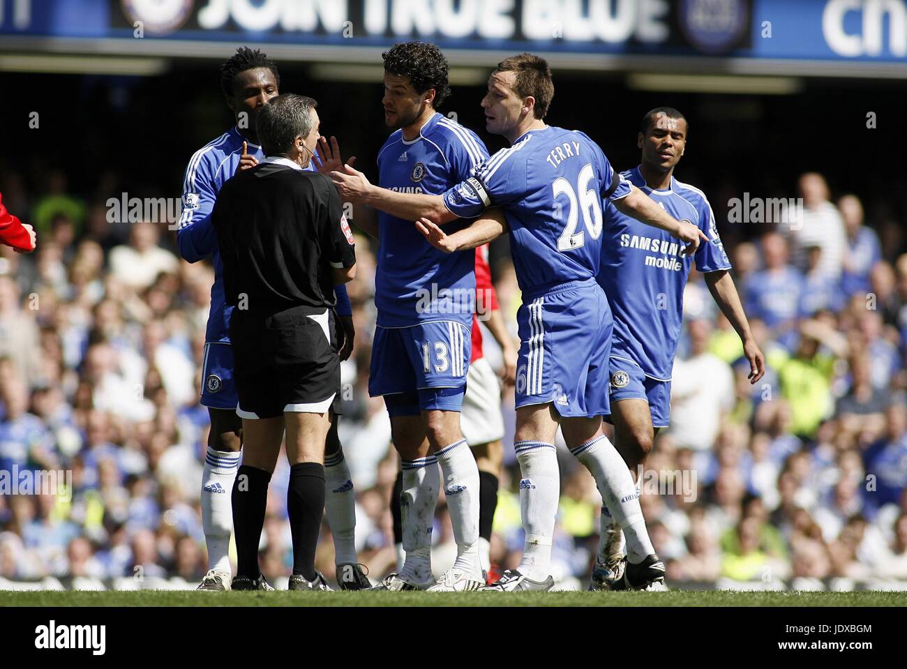 07.03.2013 Bucharest Romania..FC Steaua Bucuresti versus Chelsea Europa  League Football knock-out stages 1/8 finals. John Terry wins a powerful  header with John Obi Mikel Chelsea between Raul Rusescu(L) and Leandro Tatu  (r)