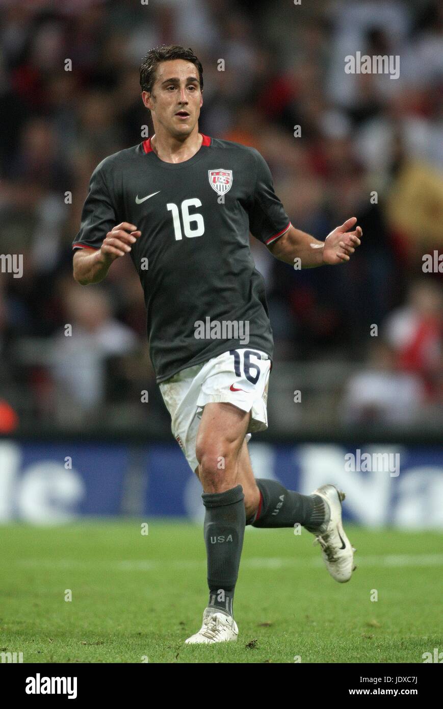 Josh Wolff of 1860 Munich leads the ball during the soccer friendly FC  Bayern Munich vs TSV 1860 Munich at Allianz-Arena in Munich, Germany, 26  January 2008. Photo: Daniel Karmann Stock Photo - Alamy