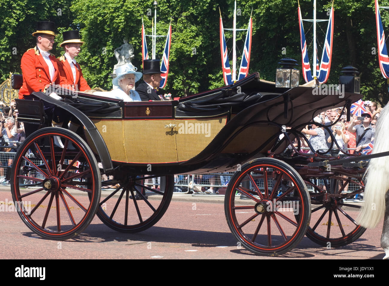 Her Royal Highness Queen Elizabeth 11 with Prince Phillip and outriders for Trooping the colour London Stock Photo
