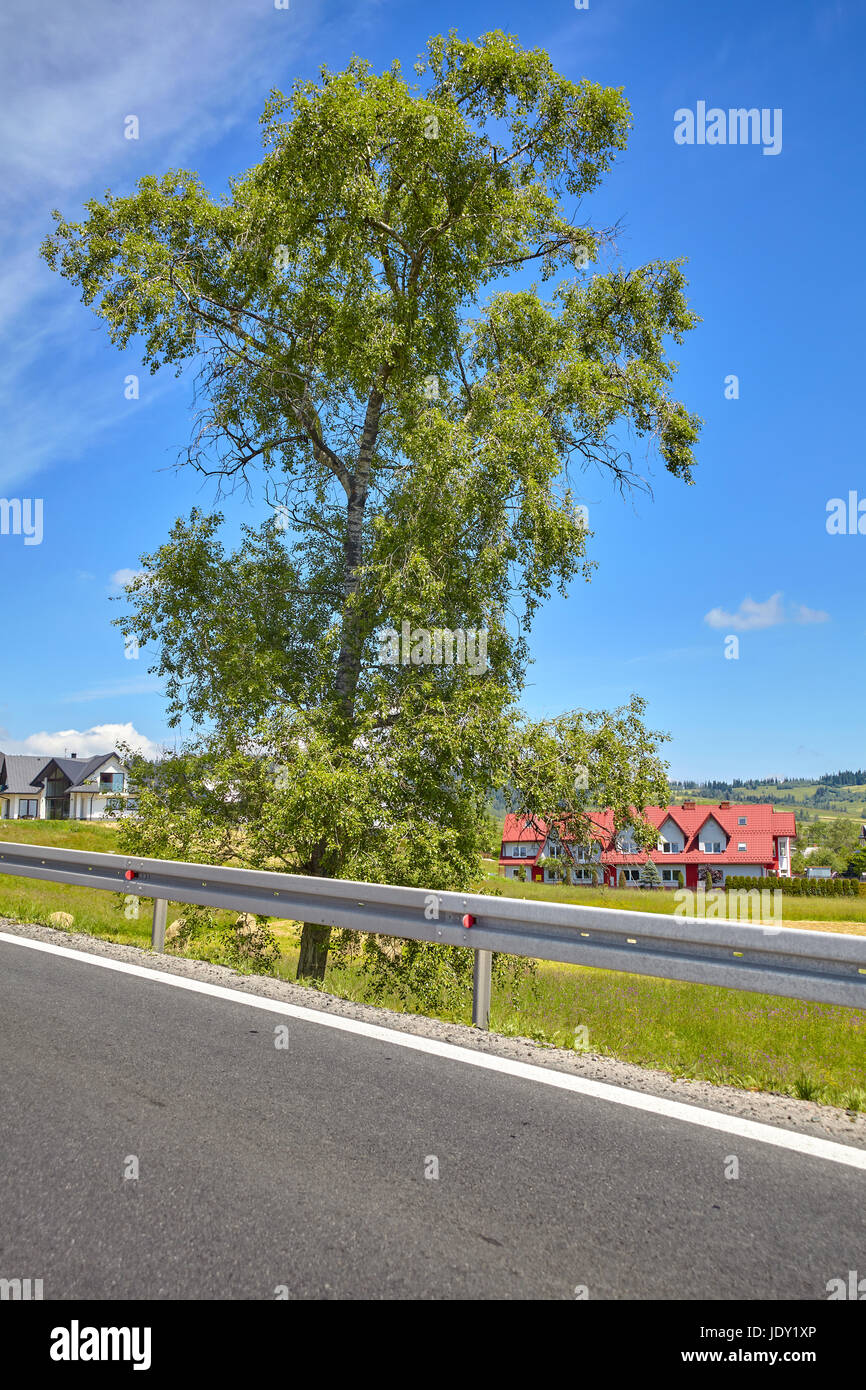 Crash barrier on a rural road, safety concept picture. Stock Photo