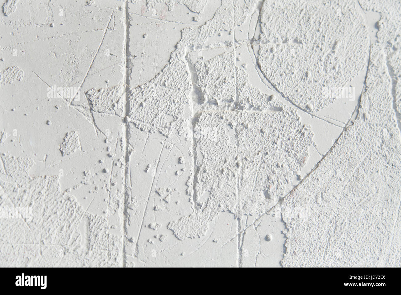 Abstract white plaster background gritty texture. Stock Photo