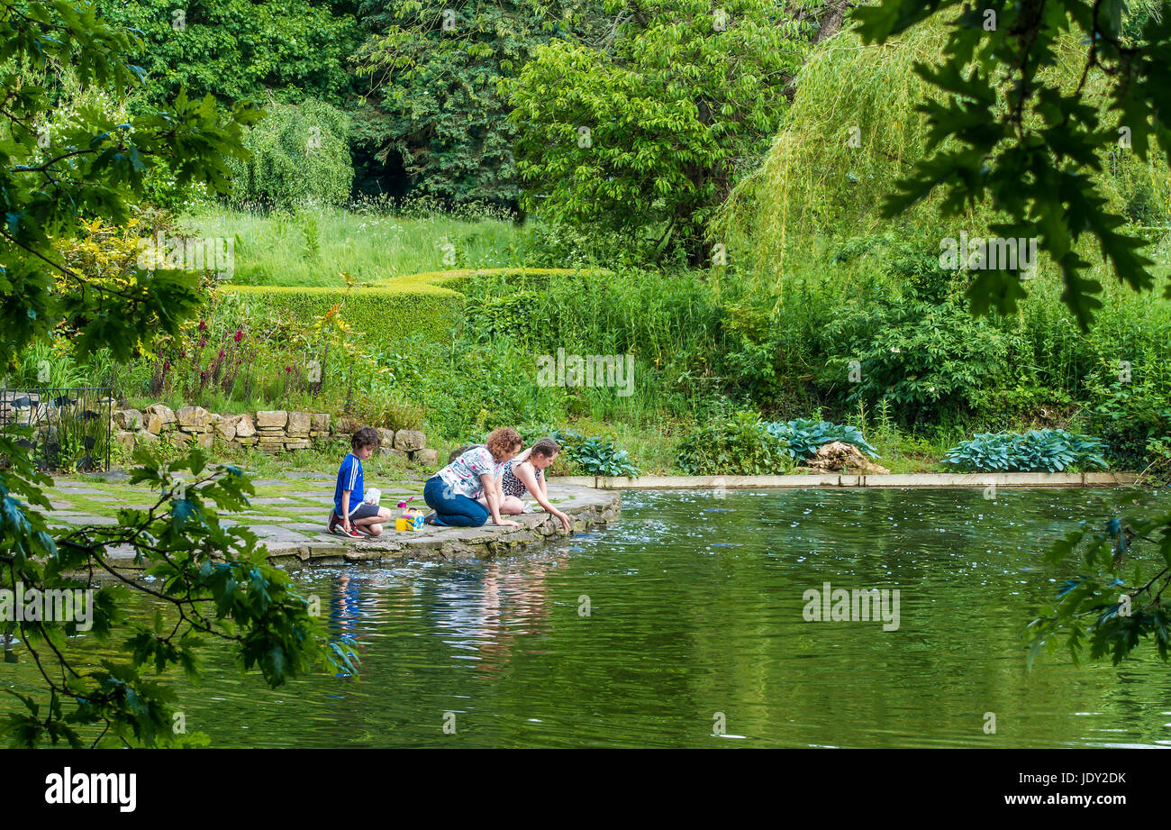 Family Feeding Fish,Lake,Elsham Park,Brigg,Nr Scunthorpe,Lincolnshire