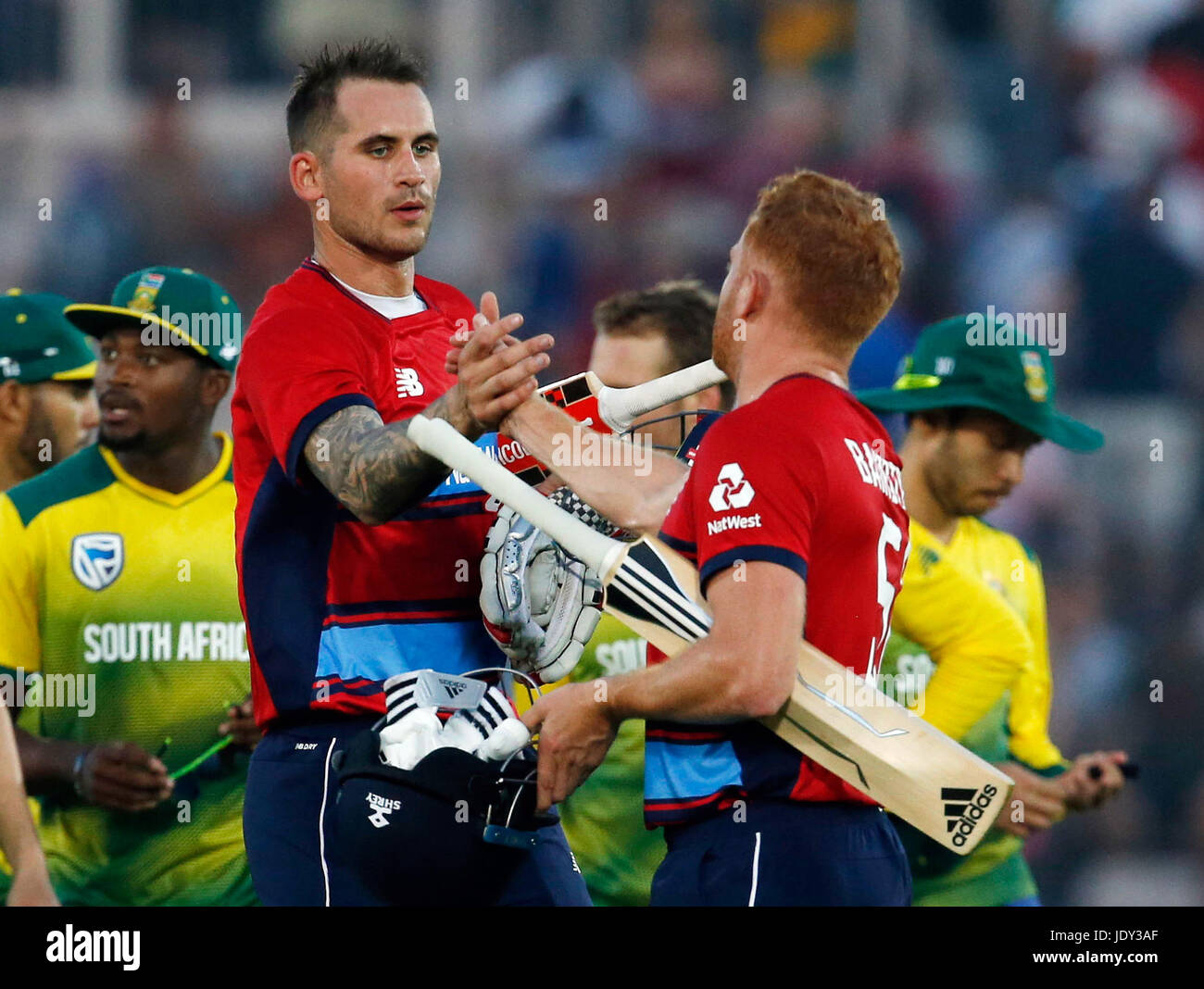 England's Alex Hales (left) and Jonny Bairstow celebrate after winning