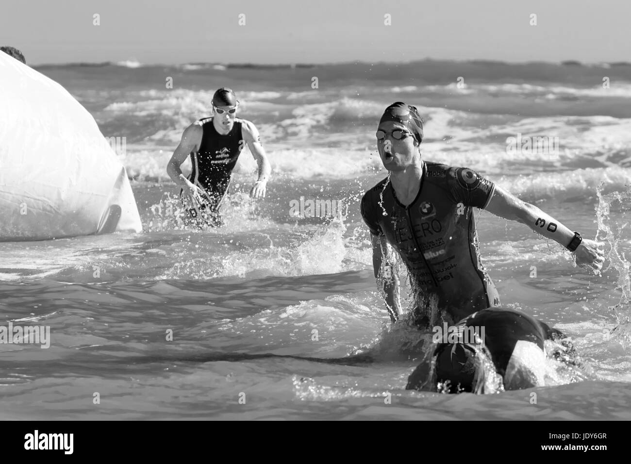 Pescara, Italy - June 18, 2017: Arrival of the first athletes at the end of the swimming test at Iroman 70.3 in Pescara Stock Photo
