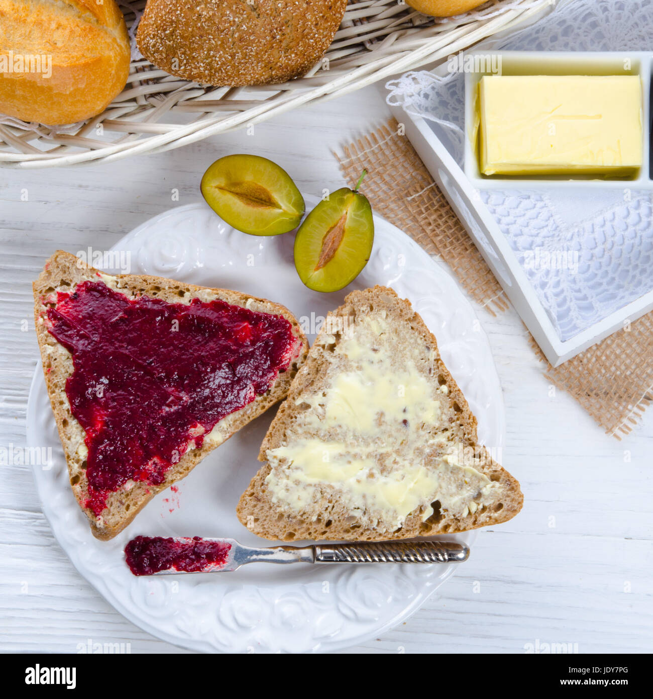 breakfast with plum jam Stock Photo Alamy