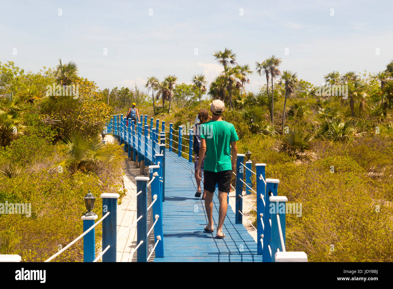 People on the walk-way in Playa Pilar, Cayo Guillermo, Cuba Stock Photo