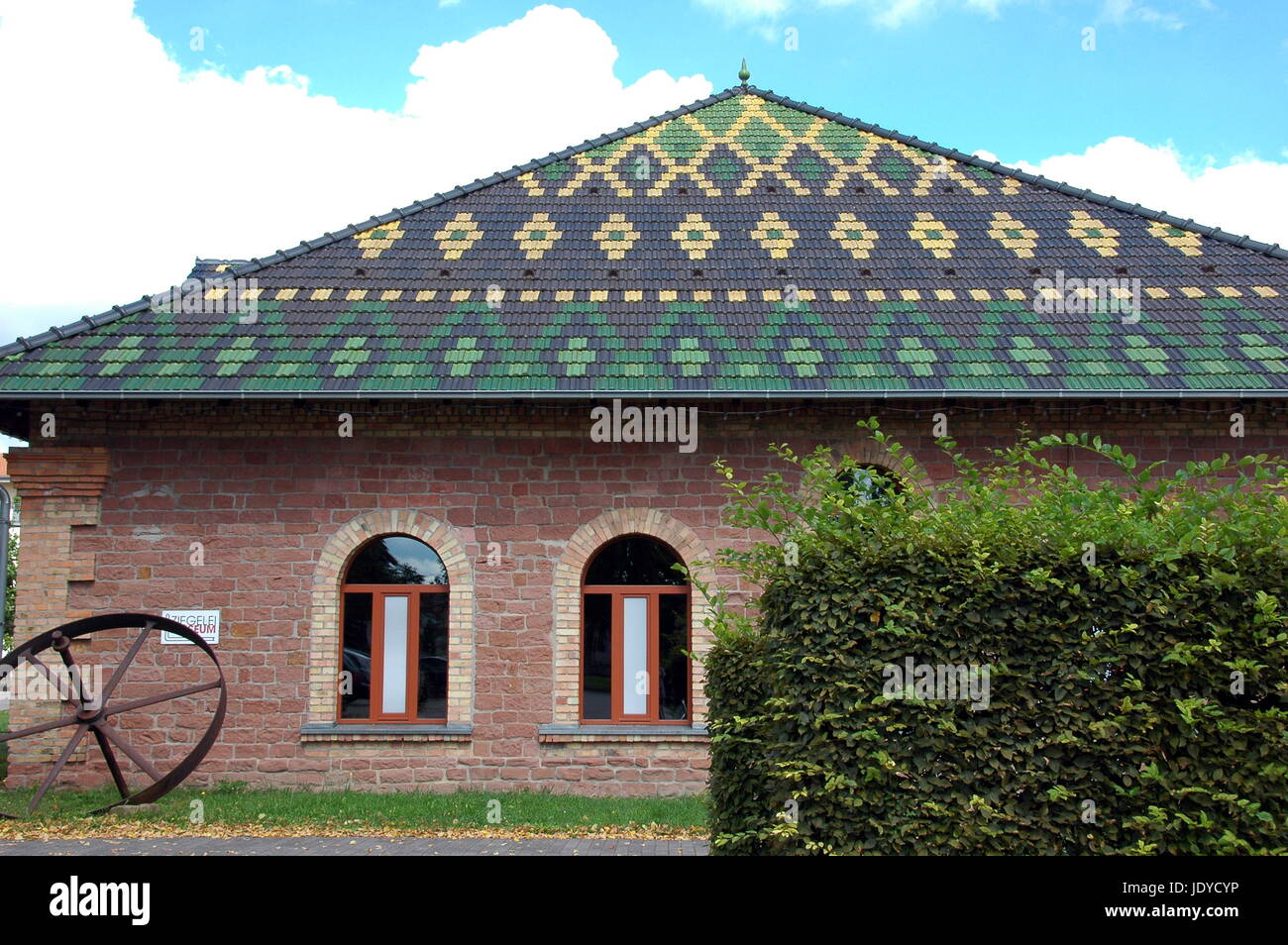 brick building tiled roof Stock Photo
