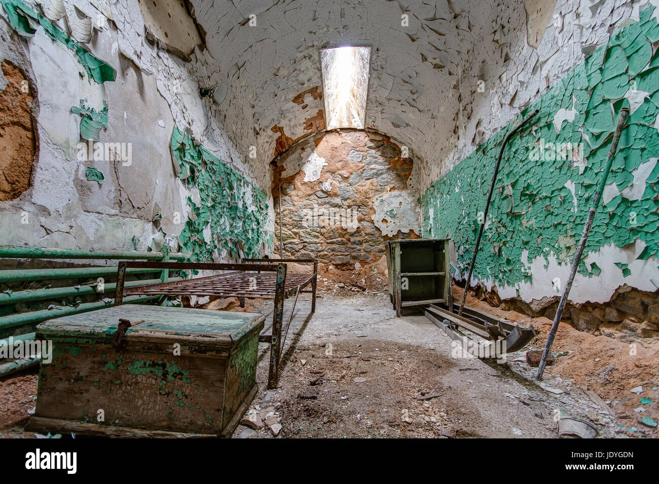 Prison cell in Eastern State Penitentiary,  also known as ESP, is a former American prison in Philadelphia, Pennsylvania. Stock Photo